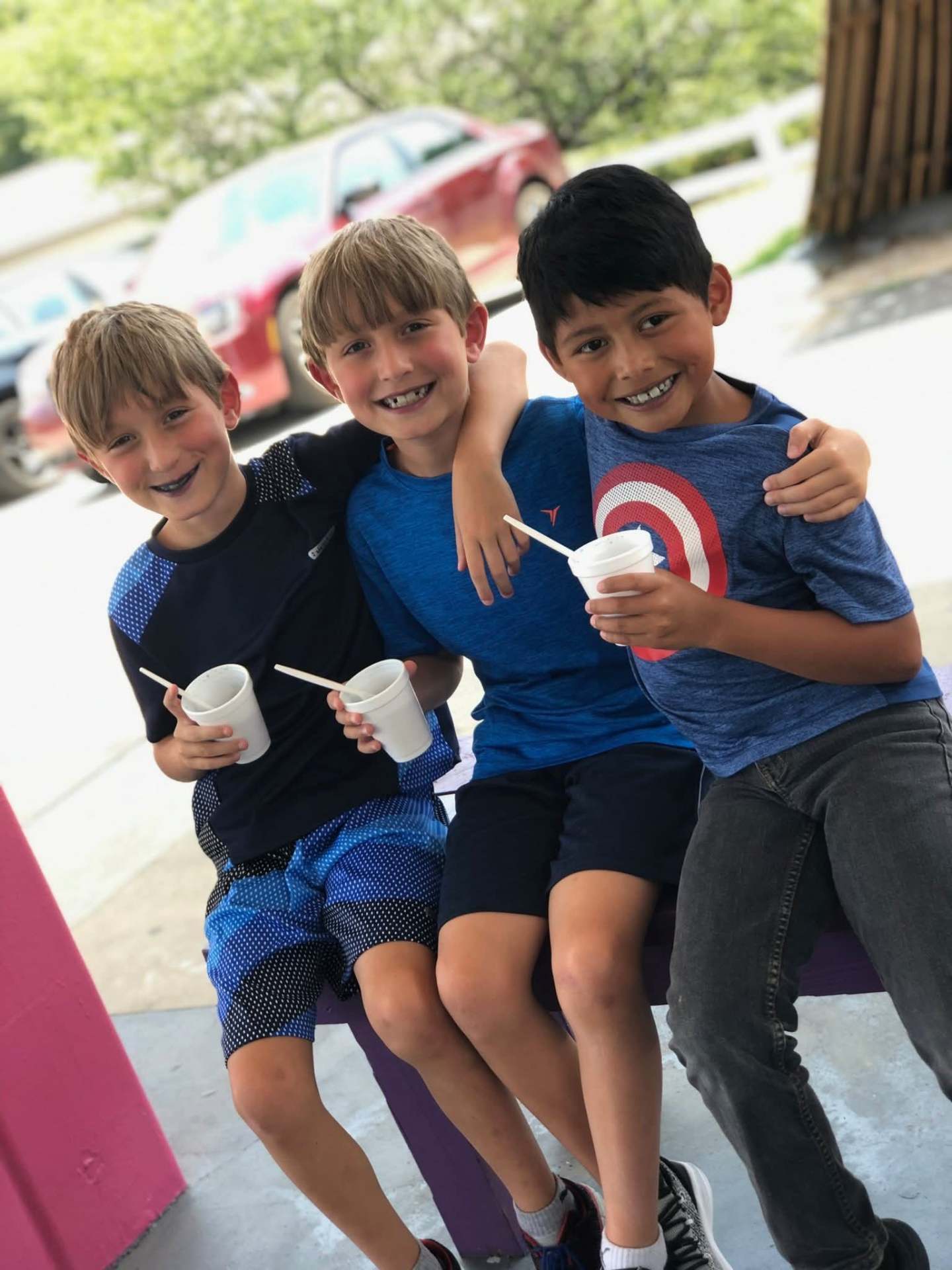 Children smiling together during a Justice Kids Academy activity