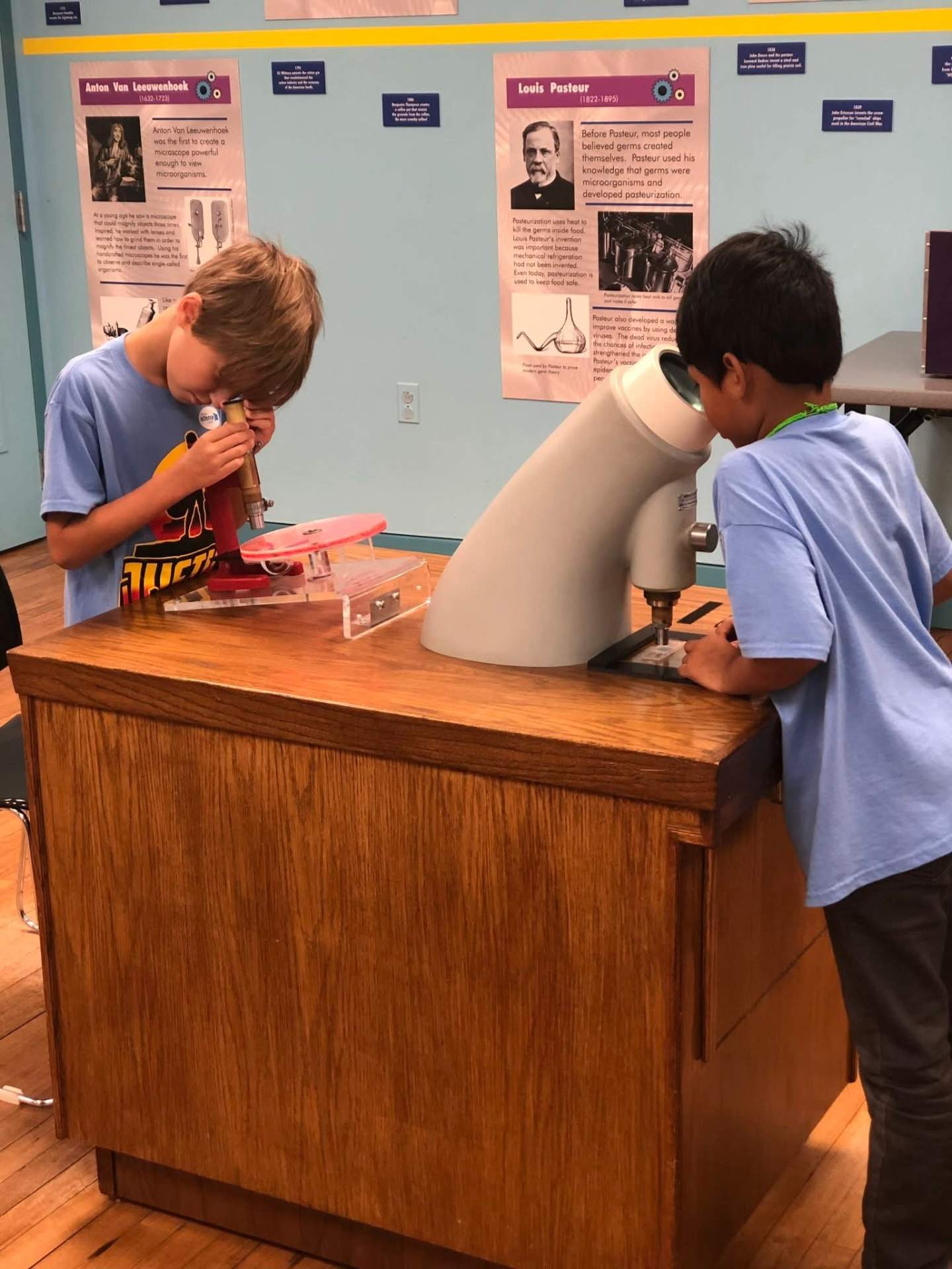 Children learning with microscopes during a science activity